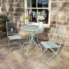 A Timeless Set Of Beautifully Designed Garden Furniture Consisting Of A Round Table And T Outdoor Patio Furniture Sets Bistro Table Outdoor Outdoor Patio Decor