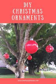 Who knew giant lollipops were exactly what you needed to complete your holiday decorations. Click To See How I Made These Huge Outdoor Christmas Tree Ornaments Giant Christmas Ornaments Outside Christmas Decorations Outdoor Christmas Tree