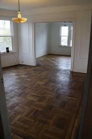 If you're considering new flooring then you'll love these colors designs and ideas for luxury vinyl plank flooring. 15 Unique Checkerboard Wood Floor Ideas To Make Your Home More Beautiful Breakpr Oak Parquet Flooring Wood Parquet Flooring Parkay Flooring