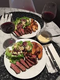 La Celebracion Continua En Casa Seared Steak Fingerling Potatoes With Charred Onion Butter Lettuce Salad