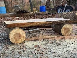 A log bench entails no more than a log split in half and fitted with legs. 20 Plans To Build A Rustic Bench From Logs Guide Patterns