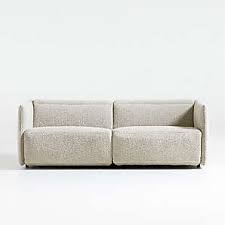 This unique design features a tall, tight tuxedo back with vertical seaming for a tailored look. High Back Sofas Crate And Barrel