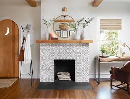 Black And White Tile Fireplace Surround Episode 1 Of Season 5 Hgtv S Fixer Upper With Chip And Joanna Gaines Fixer Upper Living Room Fireplace Mantle Decor Home