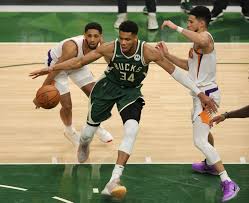 — khris middleton scored 22 points, jrue holiday added 19 points and 12 assists and the milwaukee bucks moved a win from a berth in the. Kxxkfk5nzcoqzm