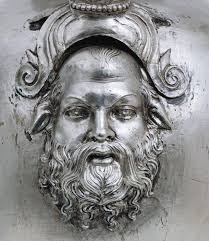 Head of Satir, detail from the decoration of silver oinochoe from the tomb  of Philip II. Macedonia Greece .. Vergina Museum GR ....