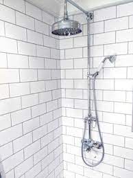 Once you add a color difference between your tile and grout, the shape of the tile is revealed more clearly, and the grout itself forms a pattern out of the negative space. White Metro Tiles With Grey Or White Grout Houzz Uk