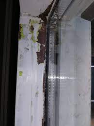Learn how to fit angle over gap between the window sill and foundation by following this video by jason windows Filling Gap Between Wooden Window Frame And Glass Home Improvement Stack Exchange