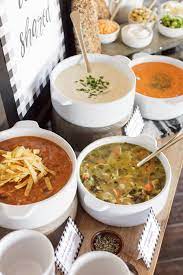 It can be an impressive meal that's fully satisfying and relatively inexpensive. 9 Tips For A Warm Cozy Soup Party The Tomkat Studio Blog Soup Dinner Soup Party Soup And Salad Bar