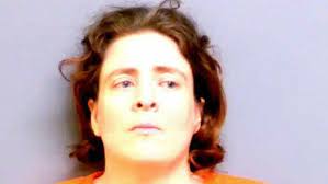Stillwater woman arrested after husband's body found decaying in mobile home