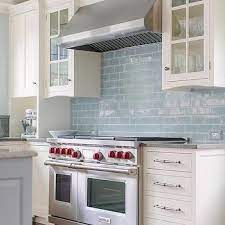 Photo gallery top 2021 kitchen design ideas, wall & cabinet colors and diy decor. White Kitchen Cabinets With Blue Glazed Subway Tiles Blue Backsplash Kitchen Blue Tile Backsplash Blue Kitchen Tiles