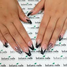 Coffin Black And Clear Nails Spider Webs And Geometric Shapes In Black On Two Hands With Clear Ballerina Nail Shape Resting On A White Pattern Coffin Nails Long Coffin Shape Nails Nails