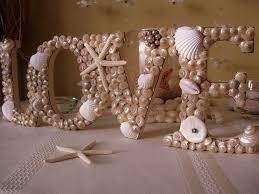 If you're doing florals for your beach wedding, try filling the bottom of a glass vase. 36 Amazing Beach Wedding Centerpieces Deer Pearl Flowers