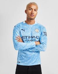 The first commercial manchester city replica shirts released for sale to the public were manufactured by umbro, who enjoyed a long standing relationship with the club. Buy Puma Manchester City Fc 2020 21 Long Sleeve Home Shirt Jd Sports