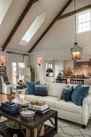 Cream Sofa And Walls Dark Wood Accents And Blue Pillows And Accents Entertaining Spa Dark Wood Living Room Blue And Cream Living Room Cream Sofa Living Room