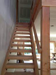 Stair Basement Stair Design With Maple Wood Treads And Handrail Combine With Square Wood Column As Newel Post Stairs Design Stair Railing Design Railing Design