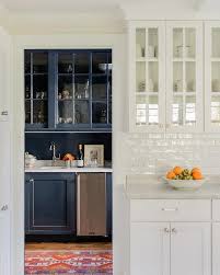 Maybe you would like to learn more about one of these? White Glazed Crackle Subway Tiles With Glass Front Cabinets Transitional Kitchen