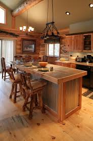 21 Unique Kitchen Island Ideas For Every Space And Budget Homelovers Rustic Kitchen Log Home Builders Cabin Kitchens