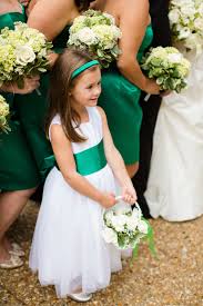 It's also said to symbolise luck. An Emerald Green Sash For The Flower Girl To Match The Bridesmaid Dresses Green Flower Girl Dresses Flower Girl Dresses Flower Girl Inspiration