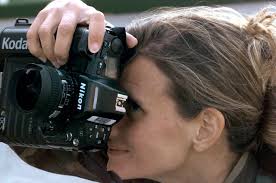 US Air Force (USAF) AIRMAN First Class (A1C) Michelle Leonard, 1ST Combat  Camera Squadron (CTCS), Charleston, South Carolina (SC), deployed to  Sarajevo, uses a DCS 420 digital camera to photograph the war-torn