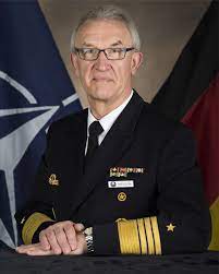 Hold on, it looks like millium wants to tell you something. Manfred Nielson Wikipedia