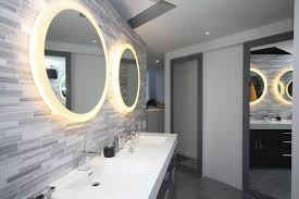 At just a little over 11lbs., the gold finish mirror has a… New York Ikea Backsplash Tiles Bathroom Contemporary With Gray Tile Floor Oval Mirrors Mirror Lighting