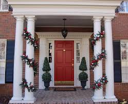 This stunning front door display is one of the many simple decor schemes that is understated, but just festive enough for the holiday season. Decorate Your Porch For Christmas Between Naps On The Porch