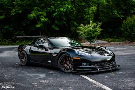 While the 2006 corvette base coupe and convertible were virtually unchanged from the previous model year, the c6's sophomore year promised to propel the emerging supercar to even higher levels of power and performance. Chevrolet Corvette C6 Z06 Black Forgestar F14 Wheel Front