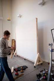 In order for a movable wall to provide sound reduction at optimum levels it needs to be installed into openings that are tailor made for it. Movable Wall On Wheels Diy Pinterest Movable Walls Studio And With Movable Wall On Wheels Movable Walls Moveable Walls Movable Wall