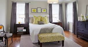 The grey skirting board creates a cohesive look, while the crisp white bedding teamed with colour pops of teal and bright yellow finishes the look. Cheerful Sophistication 25 Elegant Gray And Yellow Bedrooms