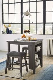 Zinc table high dining table high top tables rustic table standing table coffee and end tables condo living living room dining furniture. Caitbrook Counter Height Dining Room Table And Bar Stools Set Of 3