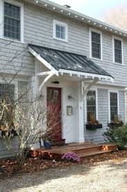 Door and overhang carriage house in 2019 the colonial red metal classic awnings over garage doors. 37 Metal Window Awnings Ideas Window Awnings Metal Awning Door Awnings
