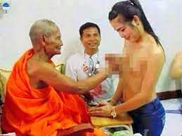 Buddhist monk snapped 'fondling woman's breast' sparks outrage in Thailand  - World News - Mirror Online
