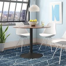 Taking the shape of a circle, this classic round table provides ample space for up to 4 diners, including numerous dishes. Latitude Run Doral 40 Pedestal Dining Table Reviews Wayfair