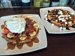 When you visit, you'll find a clean, modern space full of warm lights and comfortable seating. St Paul S New Black Coffee And Waffle Bar Does Waffles And Coffee Good