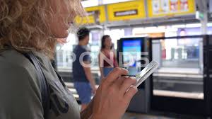 Young Woman Using Mobile Phone Waiting For Train In City Stock Footage Ad Mobile Phone Young Woman Used Mobile Phones Mobile Phone Phone