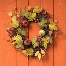 If you set it on the rim of the grapevine wreath, there should be plenty of space on the bottom of the pumpkin for a few good dollops of glue to hold it down. 25 Best Diy Fall Wreaths Easy Autumn Wreath Craft Ideas
