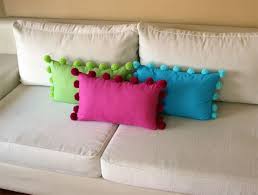 Doesn T Tell How To Sew In The Pom Poms But I Am Thinking Sew In The Strings That You Tie Any Suggestions Yastiklar Dekorasyon Fikirleri Fikirler