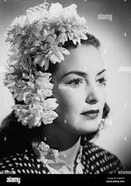 Actress with flowers hi-res stock photography and images