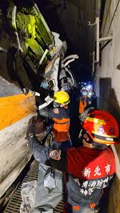 At least 48 people have been killed and dozens more injured after a train carrying nearly 500 crashed and then derailed in a tunnel in taiwan. 2ja41ewulcoqwm