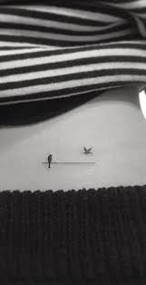 Tiny Birds On A Wire Tattoo Bird On Wire Lower Back Tattoo Smalltattoos Back Tattoo Lower Back Tattoos Back Tattoos