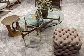 It also features a bottom shelf that can be used to keep newspapers, magazines, and other daily use items. Modern Coffee Tables With Round Glass Tops And Timeless Designs
