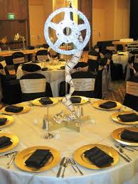 These home theater decor items are perfect for any theater enthusiast. Film Reel Centerpieces Movie Themed Party Hollywood Party Theme Hollywood Theme Party Decorations