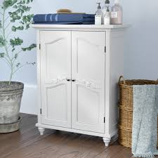 Made from engineered wood with a neutral laminate finish, this hutch fits four drawers with cutout handles pull out to provide a space to tuck away linens, bottles of lotion, and more. Charlton Home Ione 27 W X 34 H X 13 75 D Free Standing Bathroom Cabinet Reviews Wayfair