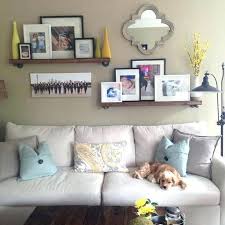 38 Getting The Best Living Room Floating Shelves Above Couch Waddenhome Family Room Walls Above Couch Decor Couch Decor