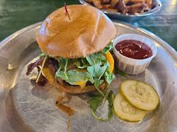 • candied bacon • grilled peaches • caramelized onion • arugula • jalapeño jam. Rodeo Goat 641 Powell Ln Plano Tx 75075 Usa