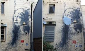 Banksy S World Famous Girl With A Pierced Eardrum Is Given A Coronavirus Twist Daily Mail Online