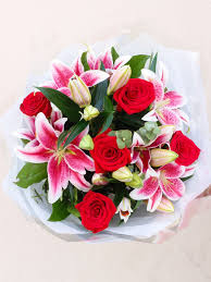 Wax flowers large flowers wedding flowers flower delivery uk send flowers online online florist spray roses floral bouquets floral birthday flowers delivery in dublin ireland. Rose And Pink Lily Hand Tied Bouquet From Flowers Ie Flower Delivery Pink Flowers Hand Tied Bouquet