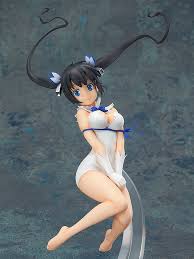 Hestia Hestia has blue eyes and has long black hair going down to her hips tied in twintails with white ribbons. hestia