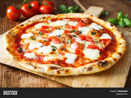 The margherita pizza, named after queen margherita of savoy, was created to represent the colors of the italian flag. Fresh Homemade Italian Image Photo Free Trial Bigstock