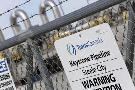 Workers survey the damage of a pipeline leak in a field near edinburg, n.d. Keystone Pipeline Closed Through Several States After 200 000 Gallon Leak In South Dakota